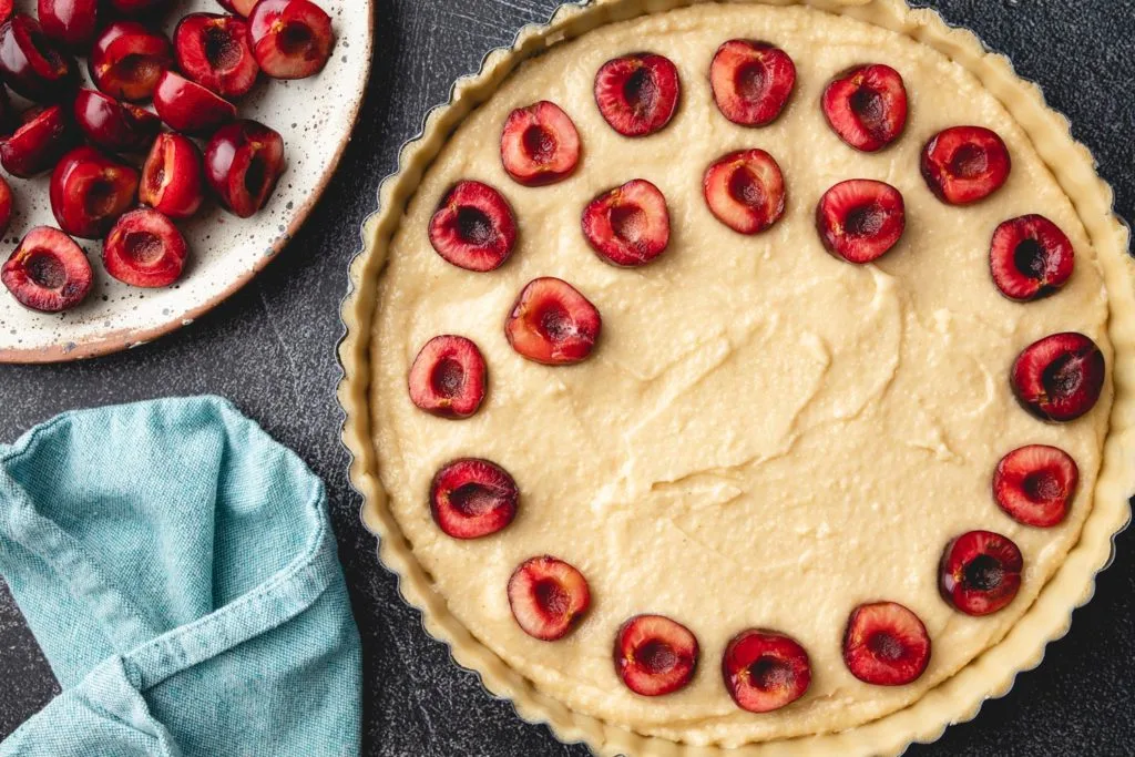 assembling the cherry frangipane tart