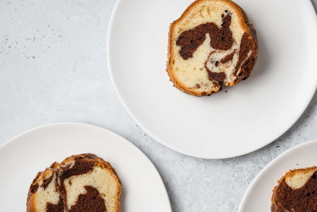 slices of marble cake on white plates